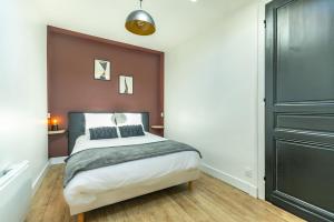 Postel nebo postele na pokoji v ubytování Le Patio - Spacieux T3 avec climatisation et jardin privatif