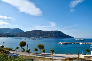 a view of a bay with boats in the water at Deep Blue Apartments in Karpathos