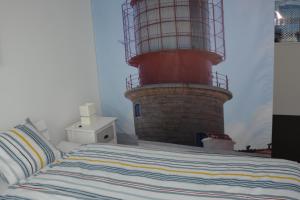 Postel nebo postele na pokoji v ubytování Leben im Hafen am idyllischen Murtensee