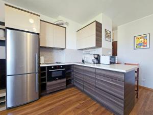 Η κουζίνα ή μικρή κουζίνα στο CLASSY APARTMENTS - AQUAPARK Reda IV