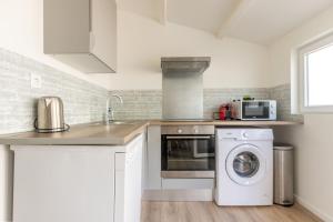 Η κουζίνα ή μικρή κουζίνα στο Le Terrazza - T3 hyper-centre avec terrasse privative