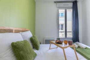 Ένα ή περισσότερα κρεβάτια σε δωμάτιο στο Le Terrazza - T3 hyper-centre avec terrasse privative