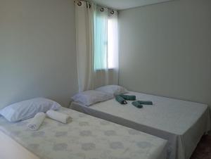 Postel nebo postele na pokoji v ubytování Quartos pra hospedagem em Maragogi