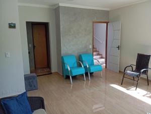 Posezení v ubytování Quartos pra hospedagem em Maragogi