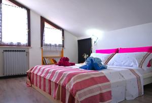 A bed or beds in a room at Piccolo paradiso