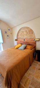 Postel nebo postele na pokoji v ubytování B&B il Nostro Sogno