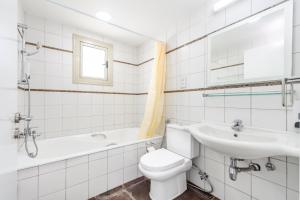 Ένα μπάνιο στο Sunrise Bay Villa #4