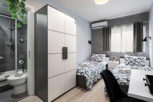 Postel nebo postele na pokoji v ubytování Modern Ensuite Rooms in Shared Apartment Near Balluta Bay Sliema Gzira