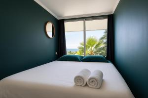 Letto o letti in una camera di Luxueux appartement - vue mer - piscine - free parking - Monaco