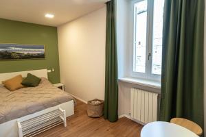 Postel nebo postele na pokoji v ubytování B&B San Gabriele