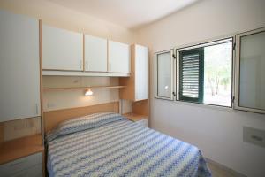 Postel nebo postele na pokoji v ubytování Villaggio San Pablo + 34 fotografií