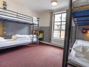 Postel nebo postele na pokoji v ubytování YHA Manchester + 37 fotografií