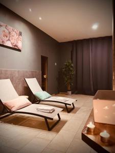 Posezení v ubytování The Rose Suites