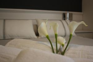 Postel nebo postele na pokoji v ubytování Hotel Herreros