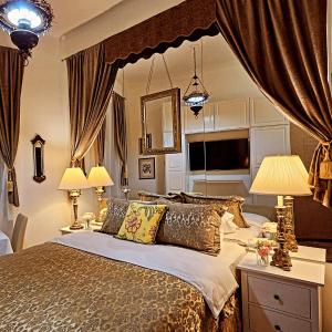 Ένα ή περισσότερα κρεβάτια σε δωμάτιο στο VANSVEL Boutique Apartment 14