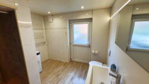 Koupelna v ubytování Ferienapartment Seemöwe im Haus "Baltic See" + 15 fotografií
