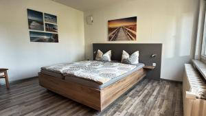 Postel nebo postele na pokoji v ubytování Ferienapartment Seemöwe im Haus "Baltic See"