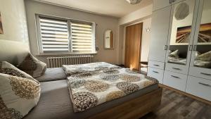 Postel nebo postele na pokoji v ubytování Ferienapartment Seemöwe im Haus "Baltic See"