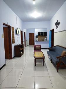 TV a/nebo společenská místnost v ubytování Bromo Jay House Homestay