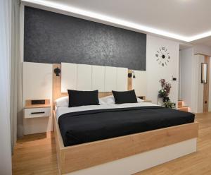 Postel nebo postele na pokoji v ubytování Residence Malva