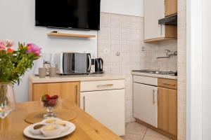 Η κουζίνα ή μικρή κουζίνα στο Villa Principi apartment Violet