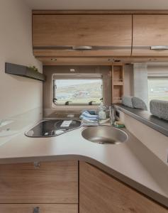 Una cocina o cocineta en Drivable Camper- Explore the Faroes in a Campervan