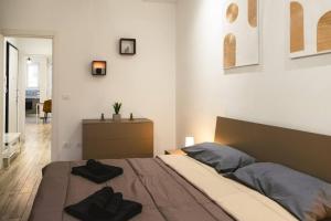 Postel nebo postele na pokoji v ubytování Inalpi Arena Modern Suite