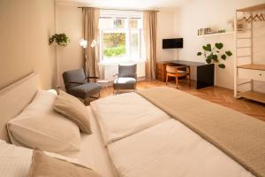 Televízia a/alebo spoločenská miestnosť v ubytovaní Bed&Breakfast & Apartment Klafé