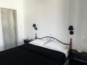 Postel nebo postele na pokoji v ubytování Studios Zafiri
