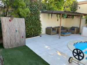 Zahrada ubytování Villa avec piscine + 3 fotografie