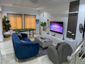 TV a/nebo společenská místnost v ubytování Global Premium Apartments