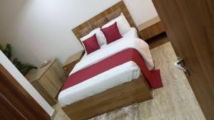 Postel nebo postele na pokoji v ubytování Global Premium Apartments + 3 fotografie