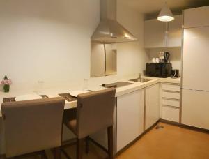 White Square Curve Hotel & Suites 주방 또는 간이 주방