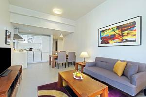 White Square Curve Hotel & Suites TV 또는 엔터테인먼트 센터