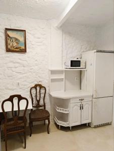 Η κουζίνα ή μικρή κουζίνα στο La Cueva Encantada +7 φωτογραφίες