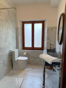 Koupelna v ubytování Casa del Gelso + 14 fotografií