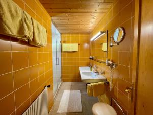 Koupelna v ubytování Hotel Garni Zerzer