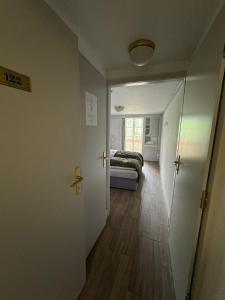 A bed or beds in a room at Double Room with view