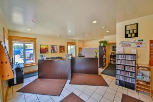 a library with a counter and a book store at Mountainside 037 in Granby