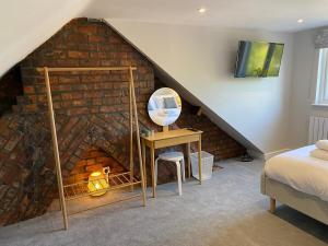 Ένα ή περισσότερα κρεβάτια σε δωμάτιο στο Jasmine Cottage +26 φωτογραφίες