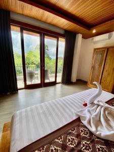 D'JERO HomeStay客房内的一张或多张床位
