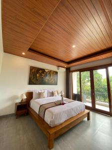 D'JERO HomeStay客房内的一张或多张床位