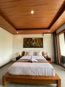 D'JERO HomeStay客房内的一张或多张床位