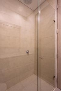 Ένα μπάνιο στο Apartamentos Porto Horizonte By OxoHotel