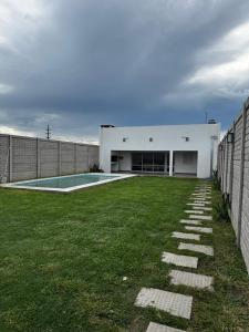 Swimmingpoolen hos eller tæt på Departamento - Casa - Quinta Temporaria