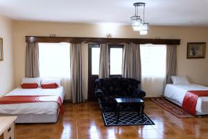 Postel nebo postele na pokoji v ubytování Unique Comfort Guest House