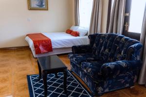 Postel nebo postele na pokoji v ubytování Unique Comfort Guest House