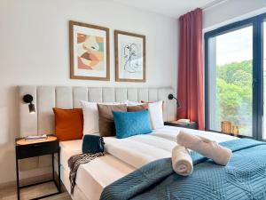 Postel nebo postele na pokoji v ubytování PANORAMA VIEW by MINT APARTMENT