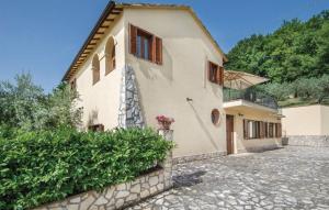 a large white house with a stone driveway at Casa Rosmarino, Ac, Wifi, Narni in Narni