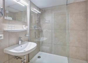 Koupelna v ubytování Hotel Mayer